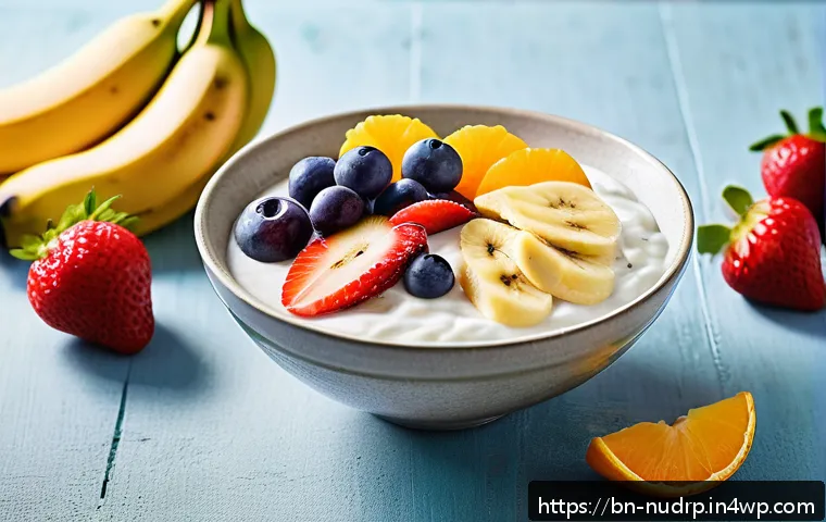 에너지를 높이는 스낵 만들기 - A vibrant and healthy snack scene featuring a bowl of fresh mixed fruits including banana slices, ap...